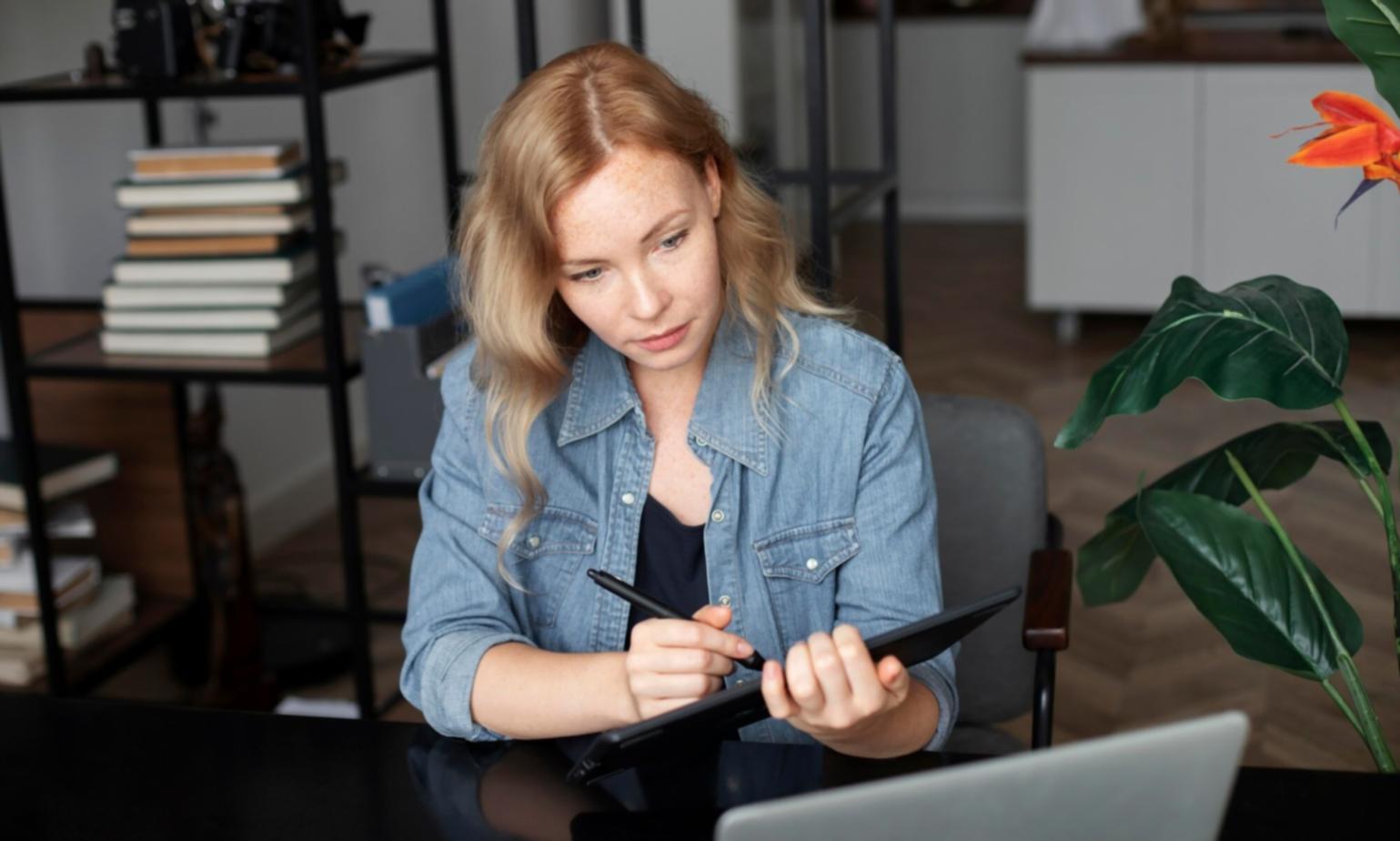 Family reviewing financial documents together at dining table